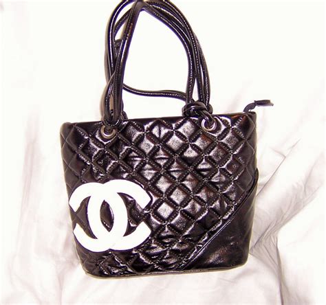 white chanel bag with black logo|chanel black bags classic quilted.